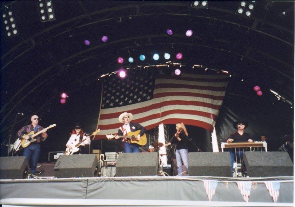 Honky Tonk DFW on stage at outdoor event