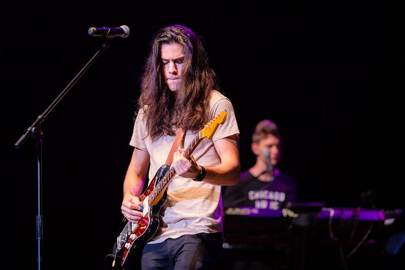 John Michael Howell playing guitar