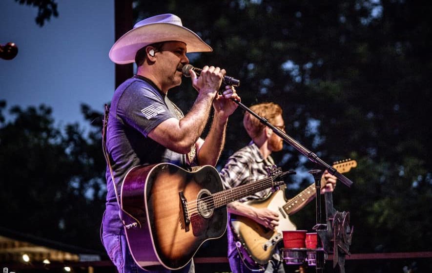 Roger Creager on outdoor stage at event