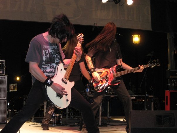 Metal band guitarist on stage