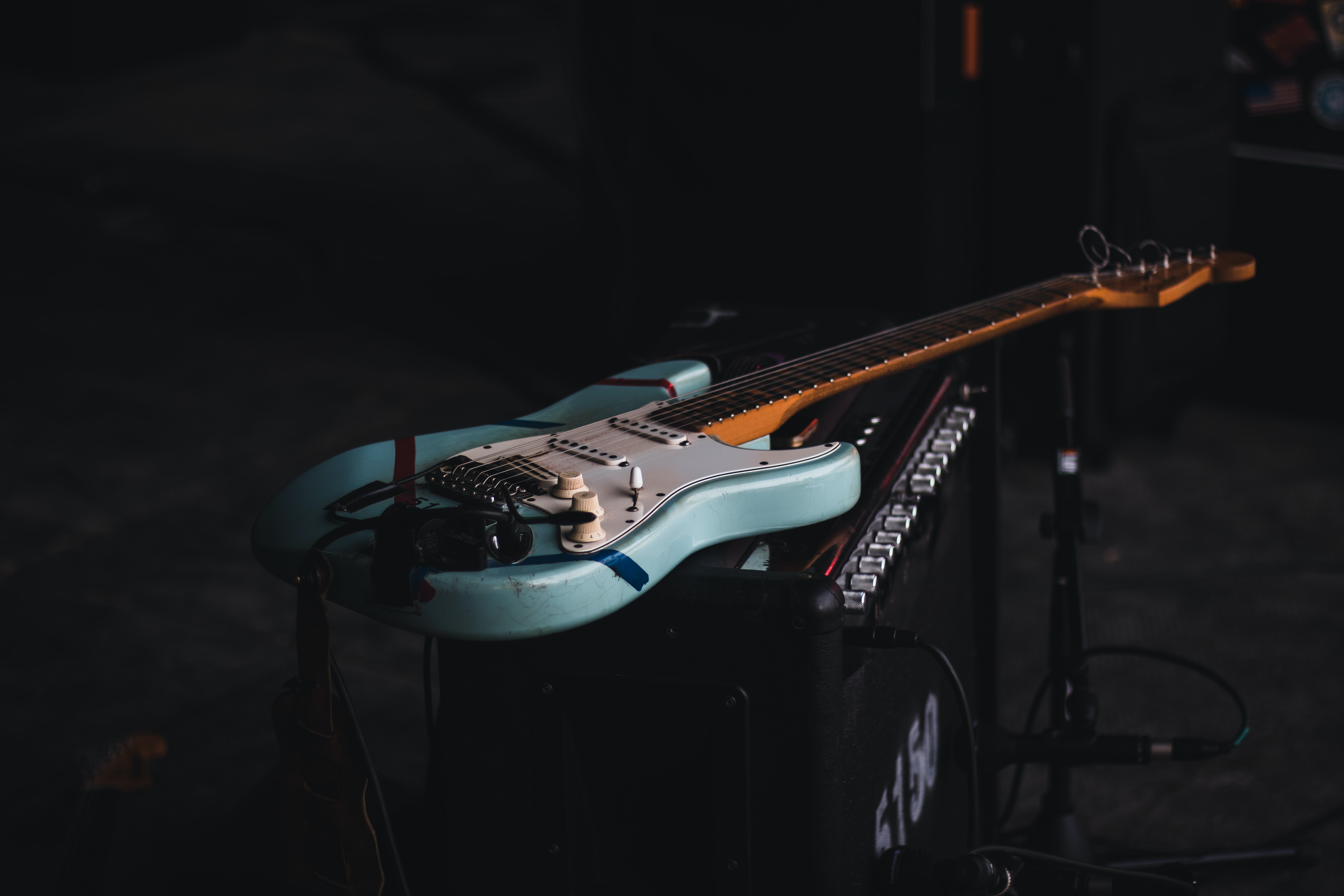 Blue guitar on black amp