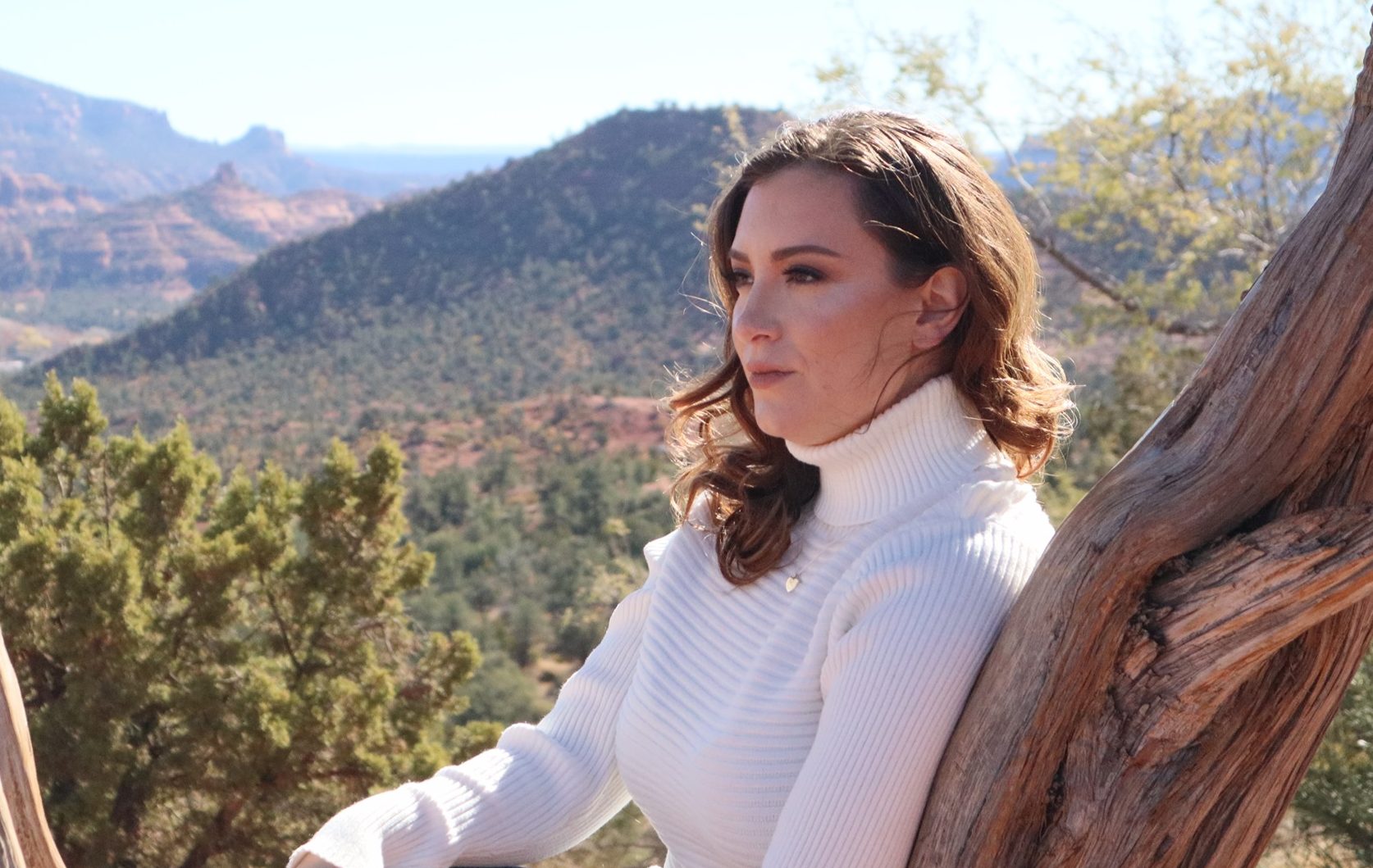 Female musician posing outside