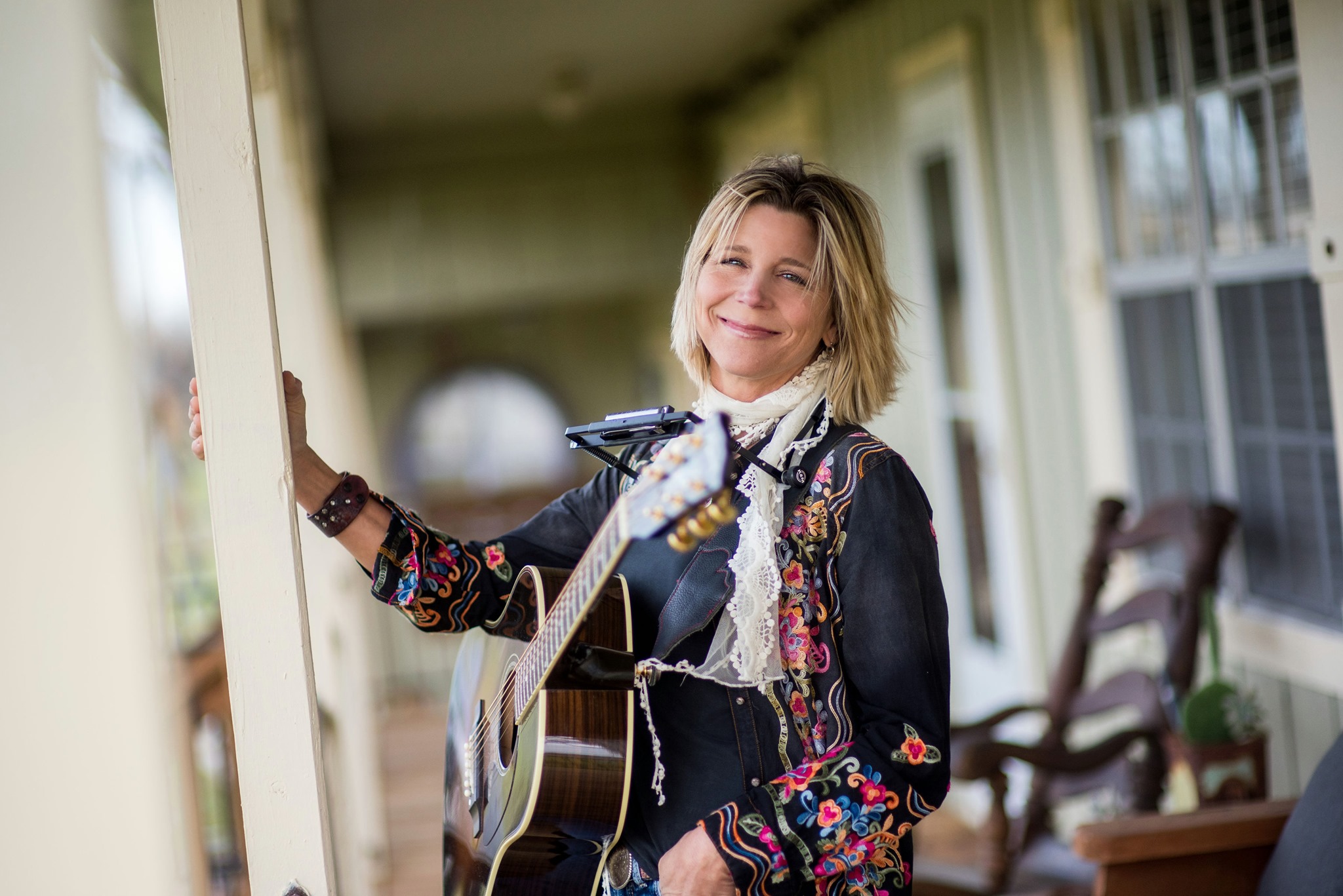 woman holding guitar